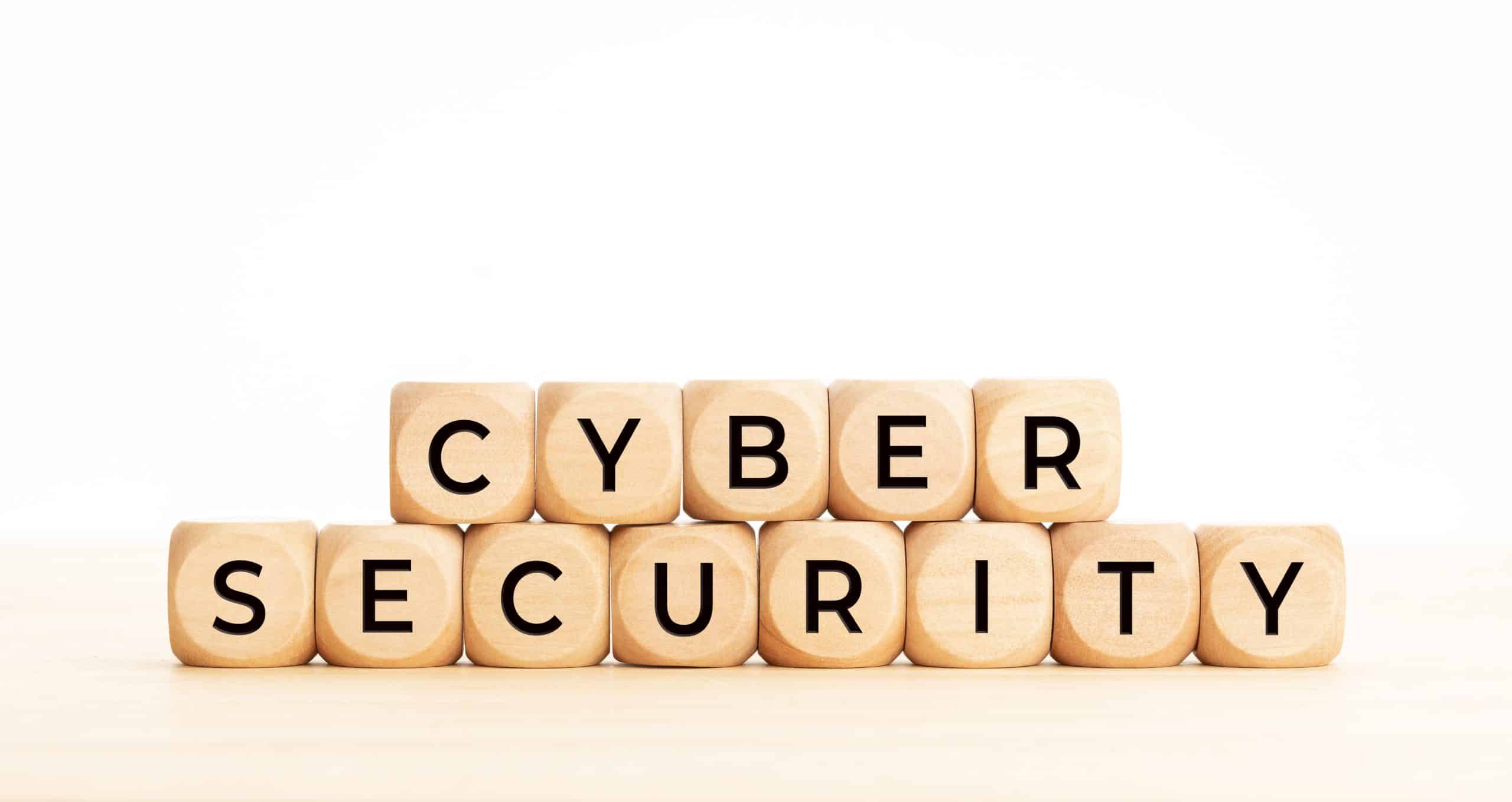 Cyber Security words on wooden block. Copy space. White background